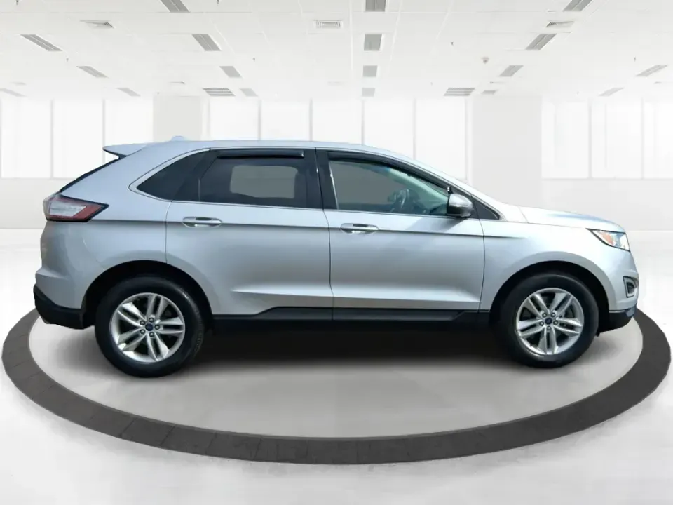2016 Ford Edge SEL (2FMPK4J88GB) with an 3.5L V6 DOHC 24V engine, 6A transmission, located at 1099 N County Rd 25A , Troy, OH, 45373, (937) 908-9800, 40.057079, -84.212883 - Need one SUV that can handle school drop-offs, long commutes to Dayton, and spontaneous weekend getaways without feeling like a chore? This **2016 Ford Edge SEL** is built for real-life driving in and around **Xenia, Ohio**-with the comfort your family wants, the confidence you need in changing weat - Photo#1