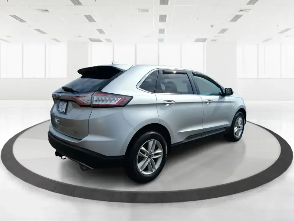 2016 Ford Edge SEL (2FMPK4J88GB) with an 3.5L V6 DOHC 24V engine, 6A transmission, located at 1099 N County Rd 25A , Troy, OH, 45373, (937) 908-9800, 40.057079, -84.212883 - Need one SUV that can handle school drop-offs, long commutes to Dayton, and spontaneous weekend getaways without feeling like a chore? This **2016 Ford Edge SEL** is built for real-life driving in and around **Xenia, Ohio**-with the comfort your family wants, the confidence you need in changing weat - Photo#2