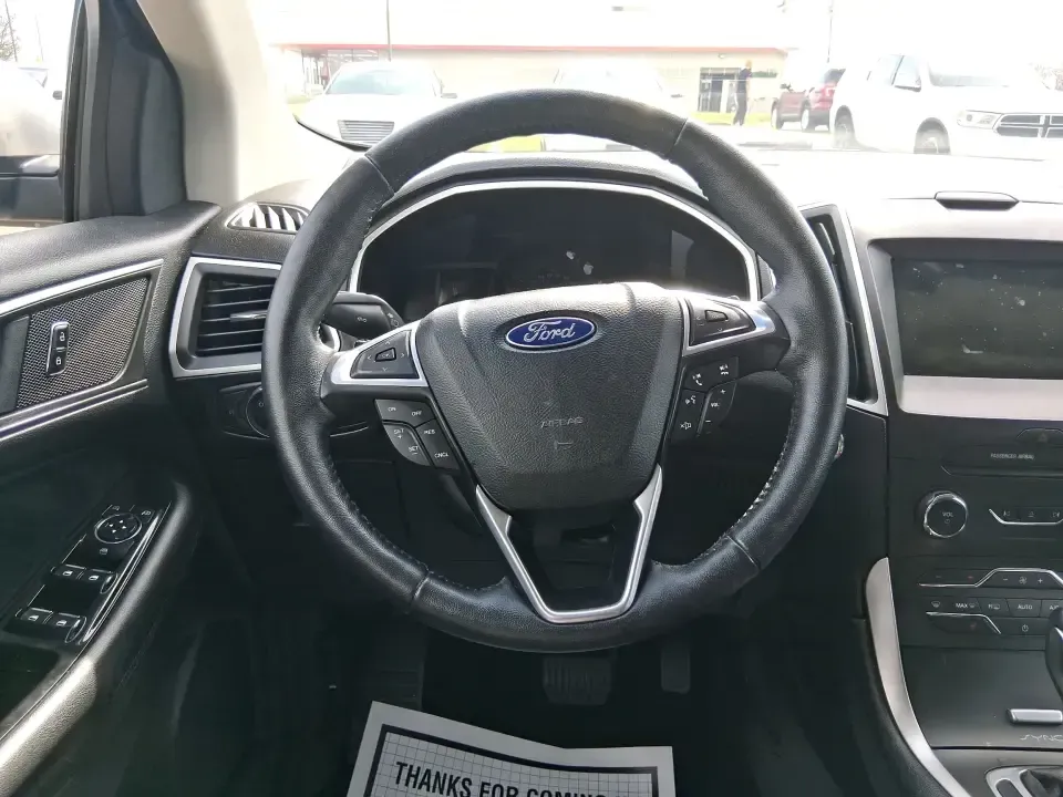 2016 Ford Edge SEL (2FMPK4J88GB) with an 3.5L V6 DOHC 24V engine, 6A transmission, located at 1099 N County Rd 25A , Troy, OH, 45373, (937) 908-9800, 40.057079, -84.212883 - Need one SUV that can handle school drop-offs, long commutes to Dayton, and spontaneous weekend getaways without feeling like a chore? This **2016 Ford Edge SEL** is built for real-life driving in and around **Xenia, Ohio**-with the comfort your family wants, the confidence you need in changing weat - Photo#16