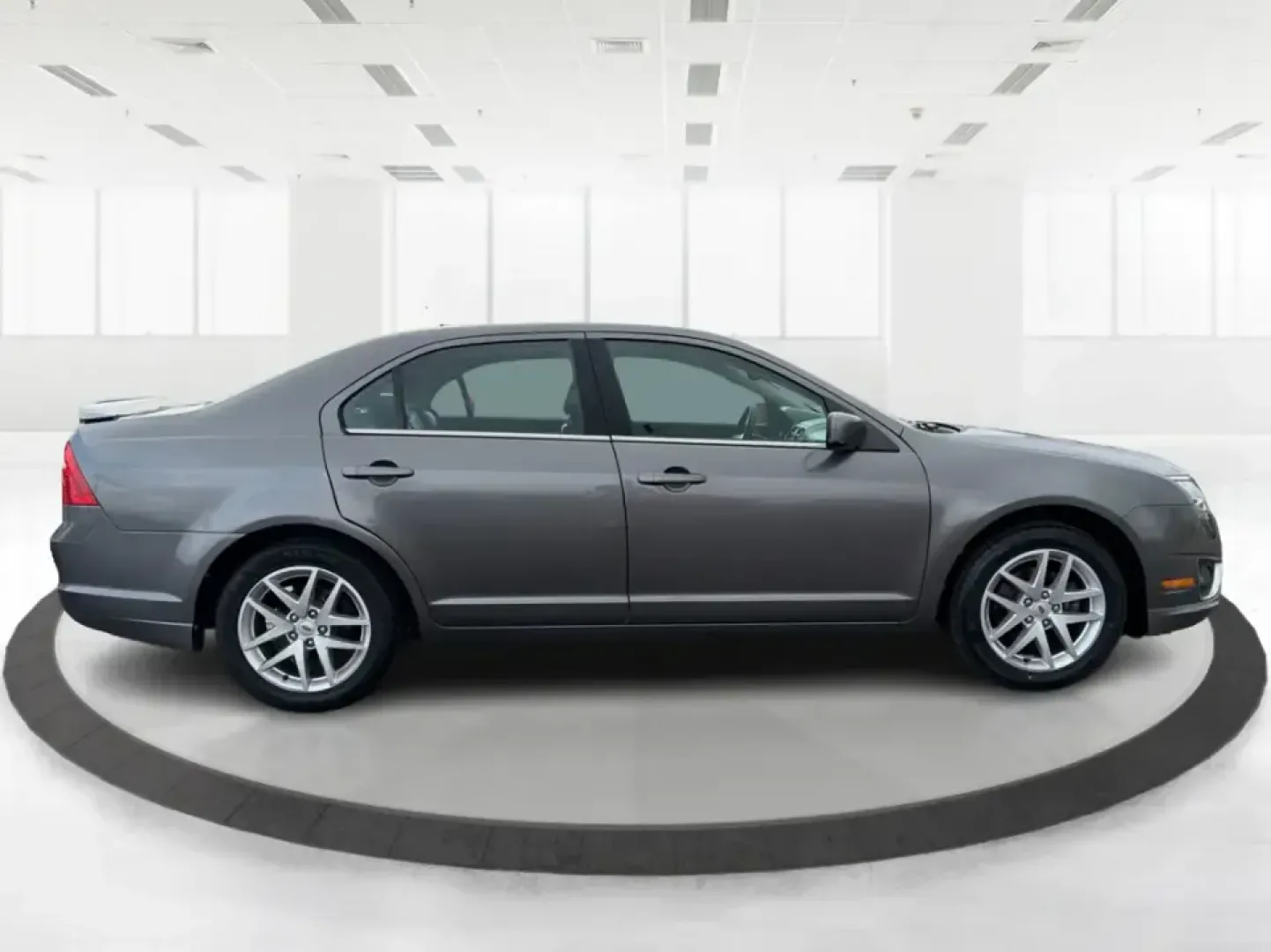 2012 Ford Fusion SEL (3FAHP0JG7CR) with an 3.0L V6 DOHC 24V engine, located at 1099 N County Rd 25A , Troy, OH, 45373, (937) 908-9800, 40.057079, -84.212883 - Need a dependable sedan that can handle the weekday commute to Dayton, quick runs up I75, and comfortable weekend drives through Miami County without draining your budget? This 2012 Ford Fusion SEL is a smart, real-world choice for drivers who want a smooth ride, confident power, and everyday practi - Photo#1