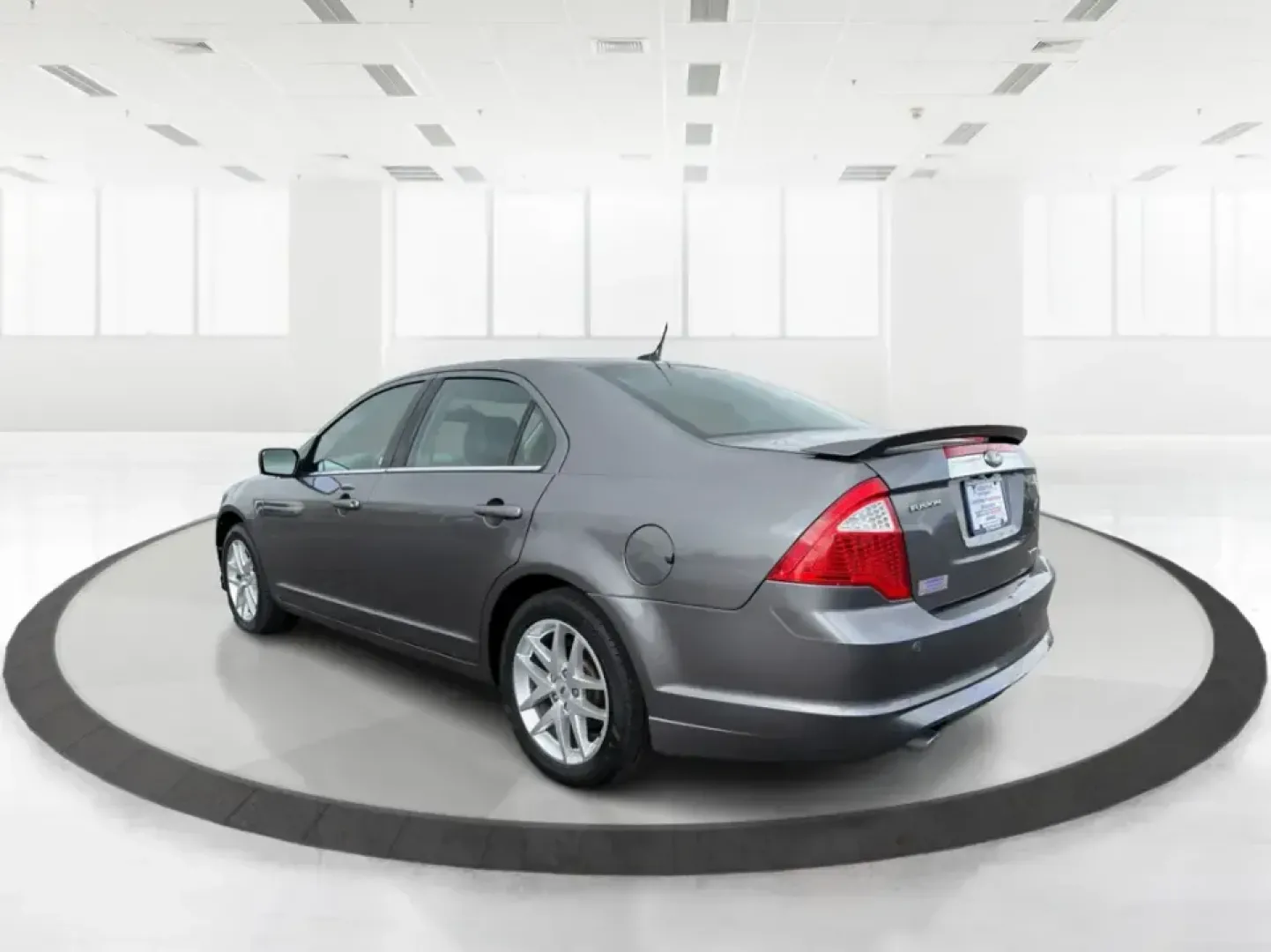 2012 Ford Fusion SEL (3FAHP0JG7CR) with an 3.0L V6 DOHC 24V engine, located at 1099 N County Rd 25A , Troy, OH, 45373, (937) 908-9800, 40.057079, -84.212883 - Need a dependable sedan that can handle the weekday commute to Dayton, quick runs up I75, and comfortable weekend drives through Miami County without draining your budget? This 2012 Ford Fusion SEL is a smart, real-world choice for drivers who want a smooth ride, confident power, and everyday practi - Photo#4