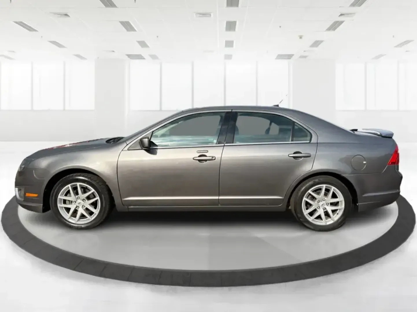 2012 Ford Fusion SEL (3FAHP0JG7CR) with an 3.0L V6 DOHC 24V engine, located at 1099 N County Rd 25A , Troy, OH, 45373, (937) 908-9800, 40.057079, -84.212883 - Need a dependable sedan that can handle the weekday commute to Dayton, quick runs up I75, and comfortable weekend drives through Miami County without draining your budget? This 2012 Ford Fusion SEL is a smart, real-world choice for drivers who want a smooth ride, confident power, and everyday practi - Photo#5