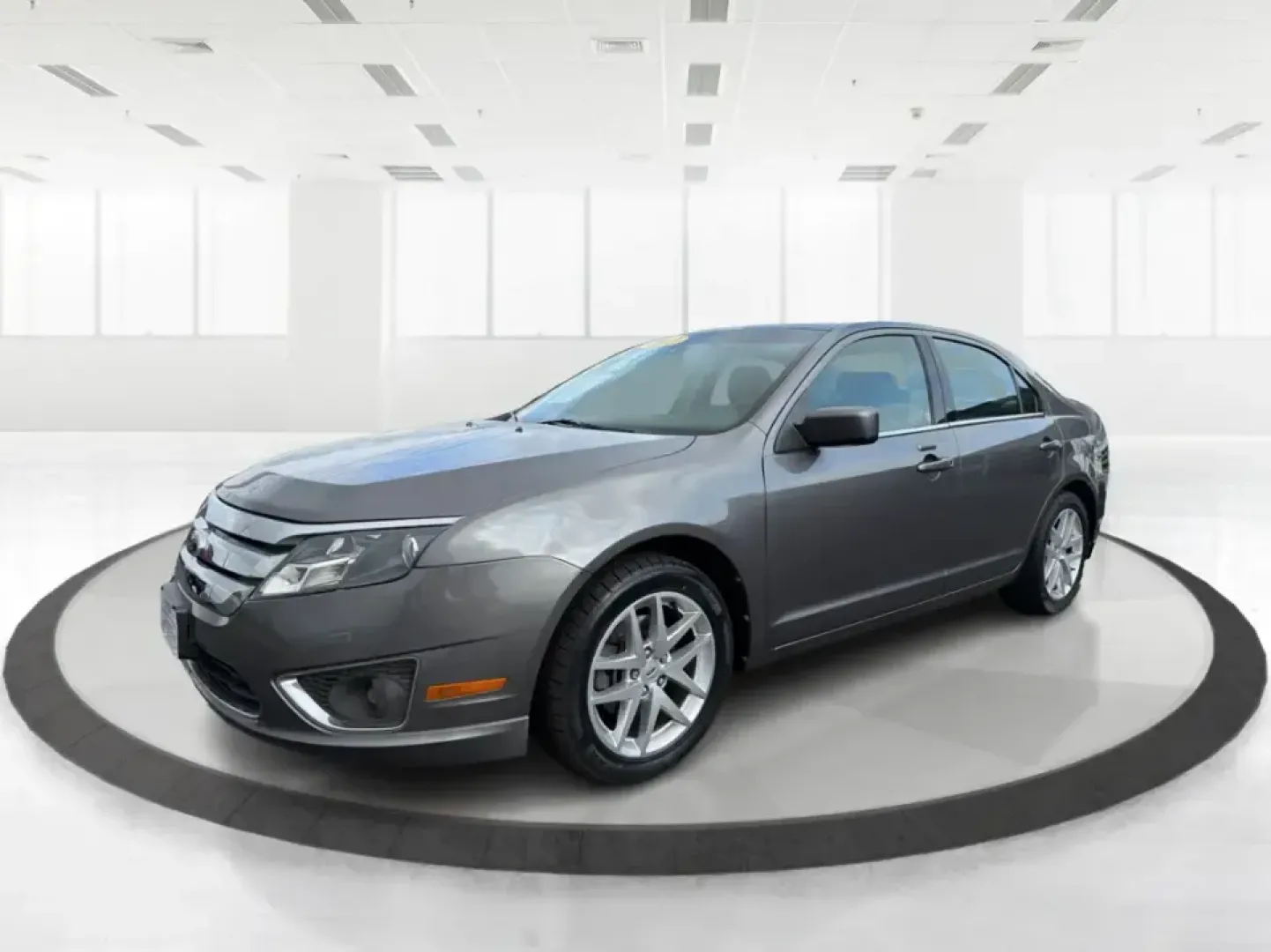 2012 Ford Fusion SEL (3FAHP0JG7CR) with an 3.0L V6 DOHC 24V engine, located at 1099 N County Rd 25A , Troy, OH, 45373, (937) 908-9800, 40.057079, -84.212883 - Need a dependable sedan that can handle the weekday commute to Dayton, quick runs up I75, and comfortable weekend drives through Miami County without draining your budget? This 2012 Ford Fusion SEL is a smart, real-world choice for drivers who want a smooth ride, confident power, and everyday practi - Photo#8