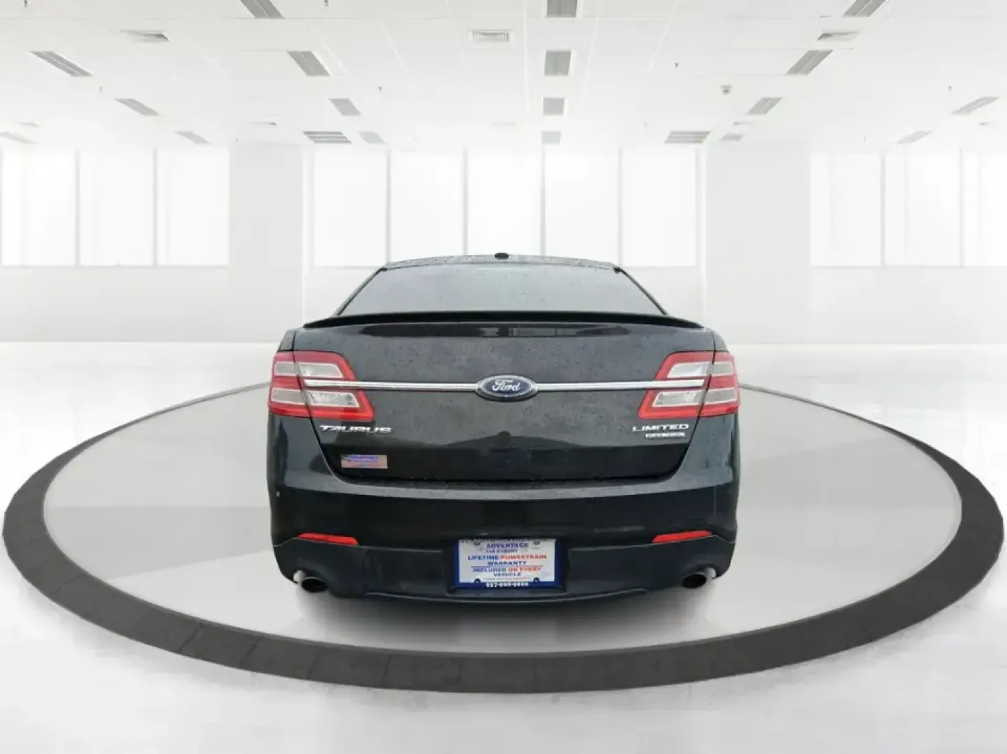 2014 Ford Taurus Limited FWD (1FAHP2F80EG) with an 3.5L V6 DOHC 24V engine, 6-Speed Automatic transmission, located at 8750 N County Rd 25A, Piqua, OH, 45356, (937) 908-9800, 40.164391, -84.232513 - Need a comfortable, confidence-inspiring sedan for a daily commute between Piqua and Dayton, school drop-offs, or weekend getaways up I-75? This 2014 Ford Taurus Limited FWD delivers the kind of quiet, upscale ride that makes long drives feel shorter-while still keeping practicality front and center - Photo#3