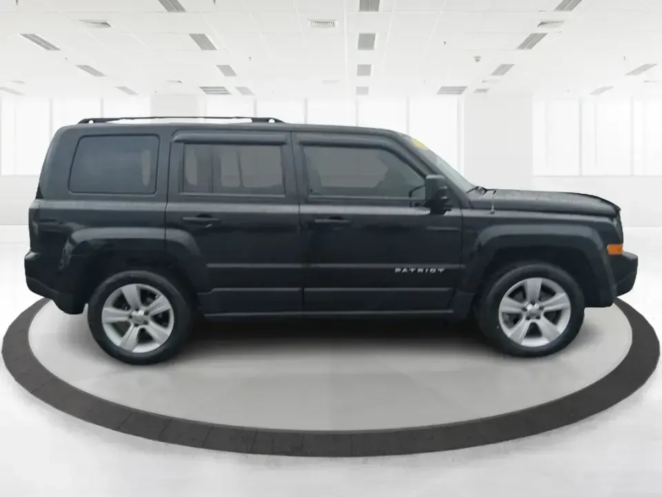2015 Jeep Patriot Latitude (1C4NJRFB8FD) with an 2.4L I-4 DOHC engine, located at 1951 S Dayton Lakeview Rd., New Carlisle, OH, 45344, (937) 908-9800, 39.890999, -84.050255 - Weekend escapes, snowy school runs, and daily commutes down I75 all get easier when you've got an SUV that's ready for Ohio weather and real-life schedules. This **2015 Jeep Patriot Latitude 4WD** is a practical choice for drivers who want the Jeep look and capability without the oversized footprint - Photo#1
