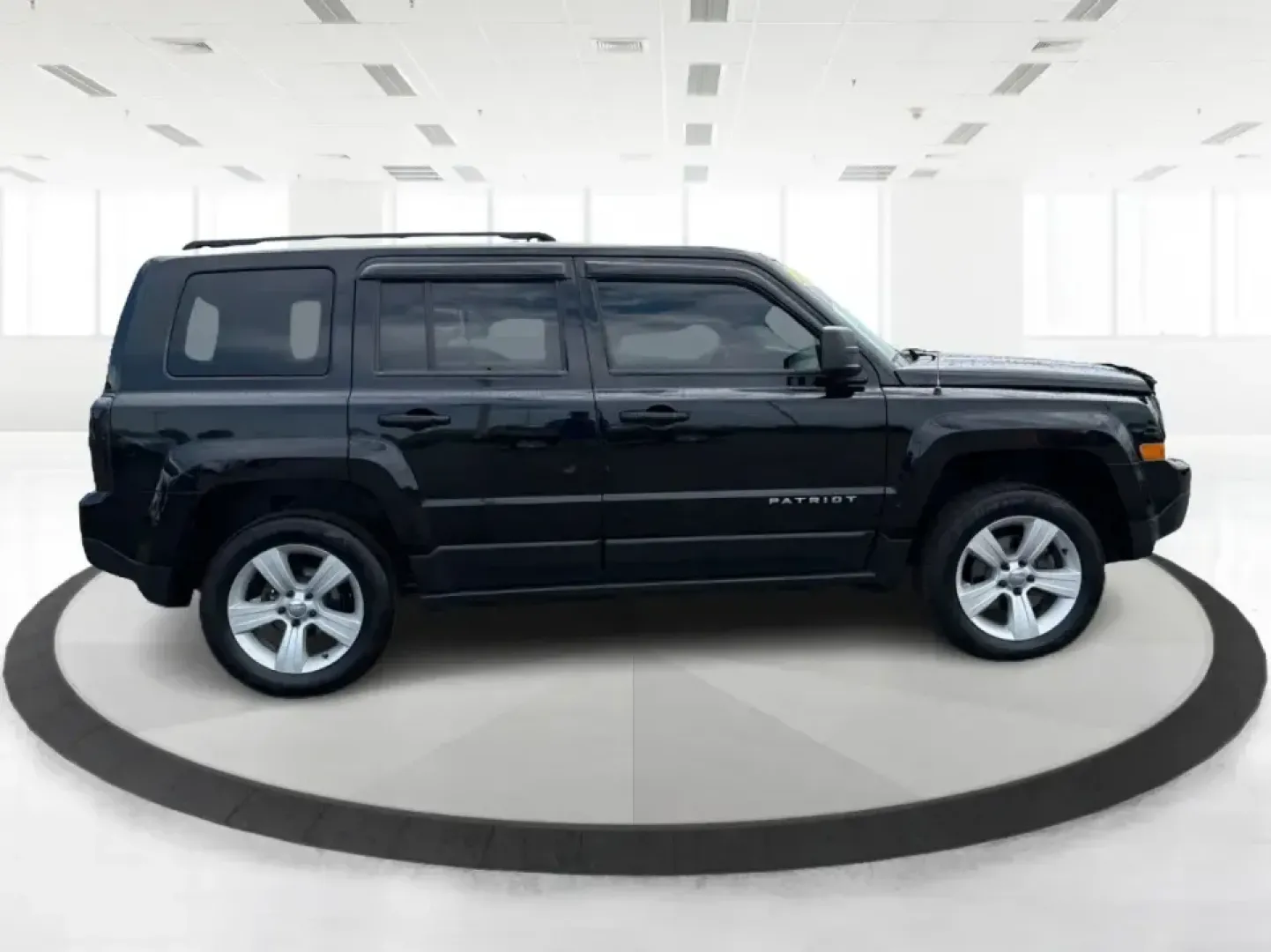 2015 Jeep Patriot Latitude 4WD (1C4NJRFB8FD) with an 2.4L L4 DOHC 16V engine, located at 401 Woodman Dr, Riverside, OH, 45431, (937) 908-9800, 39.760899, -84.123421 - Weekend getaways, snowy commutes, and everyday errands feel a lot easier when you've got an SUV that's ready for whatever Ohio throws your way. This **2015 Jeep Patriot Latitude 4WD** is a practical choice for drivers who want confident traction, versatile cargo space, and a comfortable cabin for fi - Photo#1