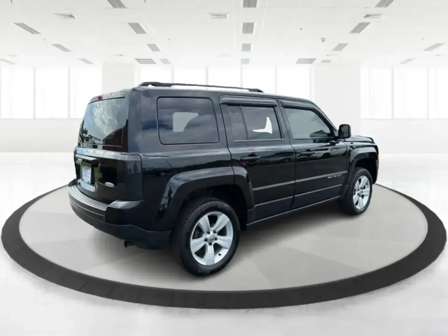 2015 Jeep Patriot Latitude 4WD (1C4NJRFB8FD) with an 2.4L L4 DOHC 16V engine, located at 401 Woodman Dr, Riverside, OH, 45431, (937) 908-9800, 39.760899, -84.123421 - Weekend getaways, snowy commutes, and everyday errands feel a lot easier when you've got an SUV that's ready for whatever Ohio throws your way. This **2015 Jeep Patriot Latitude 4WD** is a practical choice for drivers who want confident traction, versatile cargo space, and a comfortable cabin for fi - Photo#2