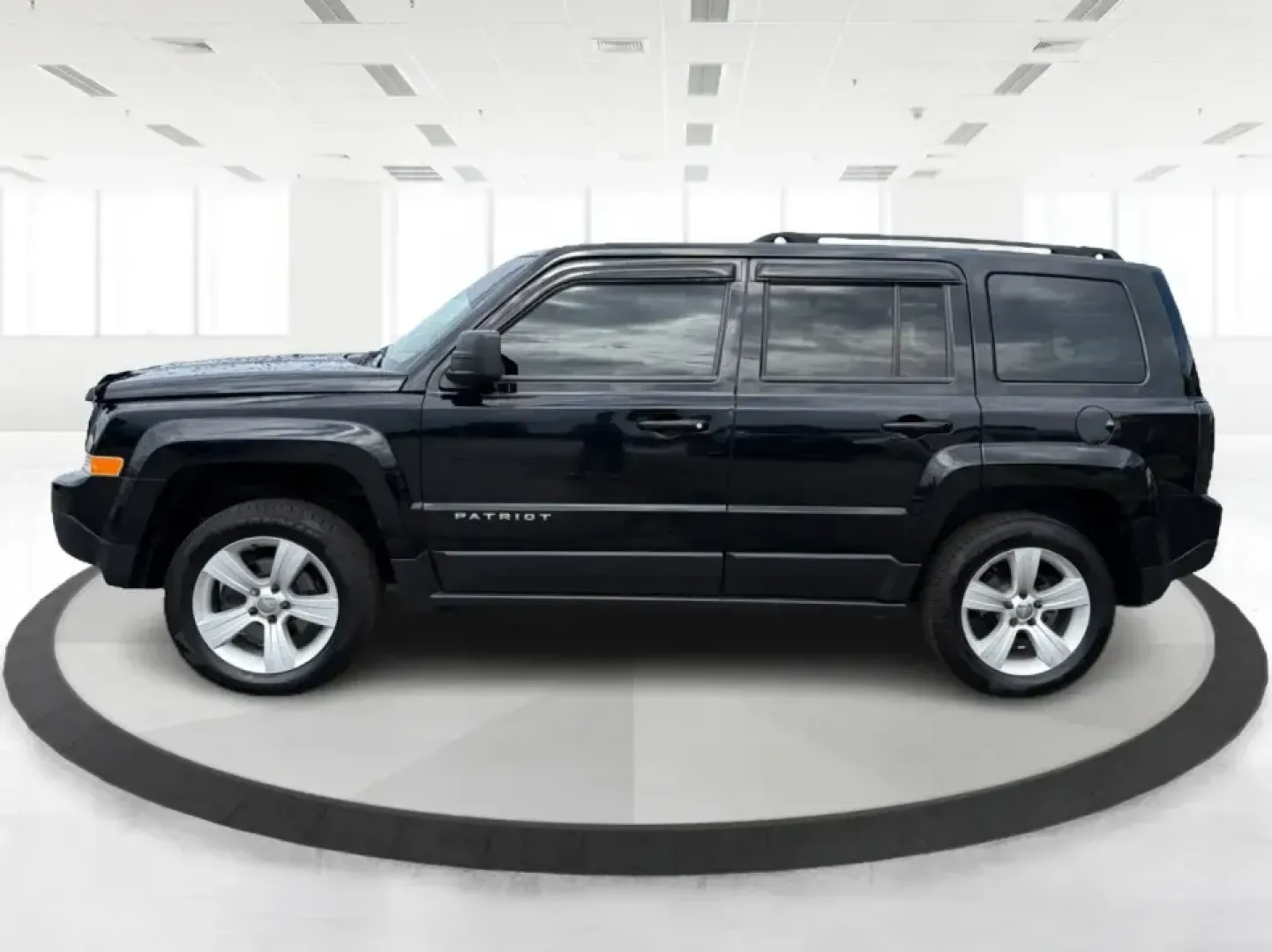 2015 Jeep Patriot Latitude 4WD (1C4NJRFB8FD) with an 2.4L L4 DOHC 16V engine, located at 401 Woodman Dr, Riverside, OH, 45431, (937) 908-9800, 39.760899, -84.123421 - Weekend getaways, snowy commutes, and everyday errands feel a lot easier when you've got an SUV that's ready for whatever Ohio throws your way. This **2015 Jeep Patriot Latitude 4WD** is a practical choice for drivers who want confident traction, versatile cargo space, and a comfortable cabin for fi - Photo#5