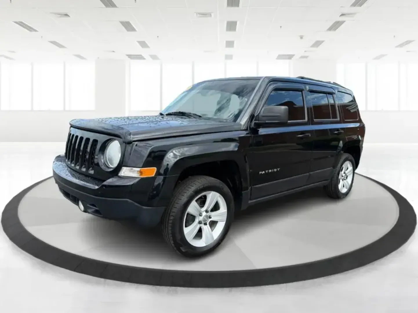 2015 Jeep Patriot Latitude 4WD (1C4NJRFB8FD) with an 2.4L L4 DOHC 16V engine, located at 401 Woodman Dr, Riverside, OH, 45431, (937) 908-9800, 39.760899, -84.123421 - Weekend getaways, snowy commutes, and everyday errands feel a lot easier when you've got an SUV that's ready for whatever Ohio throws your way. This **2015 Jeep Patriot Latitude 4WD** is a practical choice for drivers who want confident traction, versatile cargo space, and a comfortable cabin for fi - Photo#8