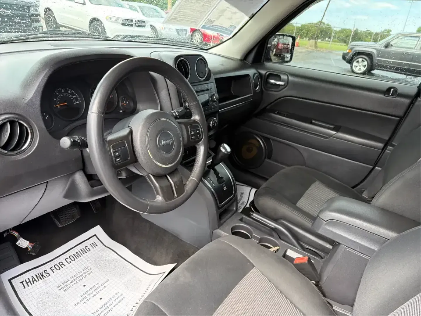 2015 Jeep Patriot Latitude 4WD (1C4NJRFB8FD) with an 2.4L L4 DOHC 16V engine, located at 401 Woodman Dr, Riverside, OH, 45431, (937) 908-9800, 39.760899, -84.123421 - Weekend getaways, snowy commutes, and everyday errands feel a lot easier when you've got an SUV that's ready for whatever Ohio throws your way. This **2015 Jeep Patriot Latitude 4WD** is a practical choice for drivers who want confident traction, versatile cargo space, and a comfortable cabin for fi - Photo#9