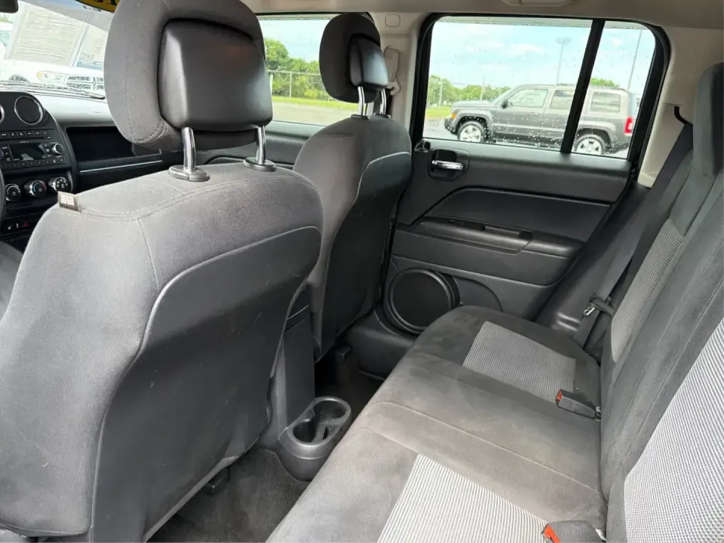 2015 Jeep Patriot Latitude 4WD (1C4NJRFB8FD) with an 2.4L L4 DOHC 16V engine, located at 401 Woodman Dr, Riverside, OH, 45431, (937) 908-9800, 39.760899, -84.123421 - Weekend getaways, snowy commutes, and everyday errands feel a lot easier when you've got an SUV that's ready for whatever Ohio throws your way. This **2015 Jeep Patriot Latitude 4WD** is a practical choice for drivers who want confident traction, versatile cargo space, and a comfortable cabin for fi - Photo#10
