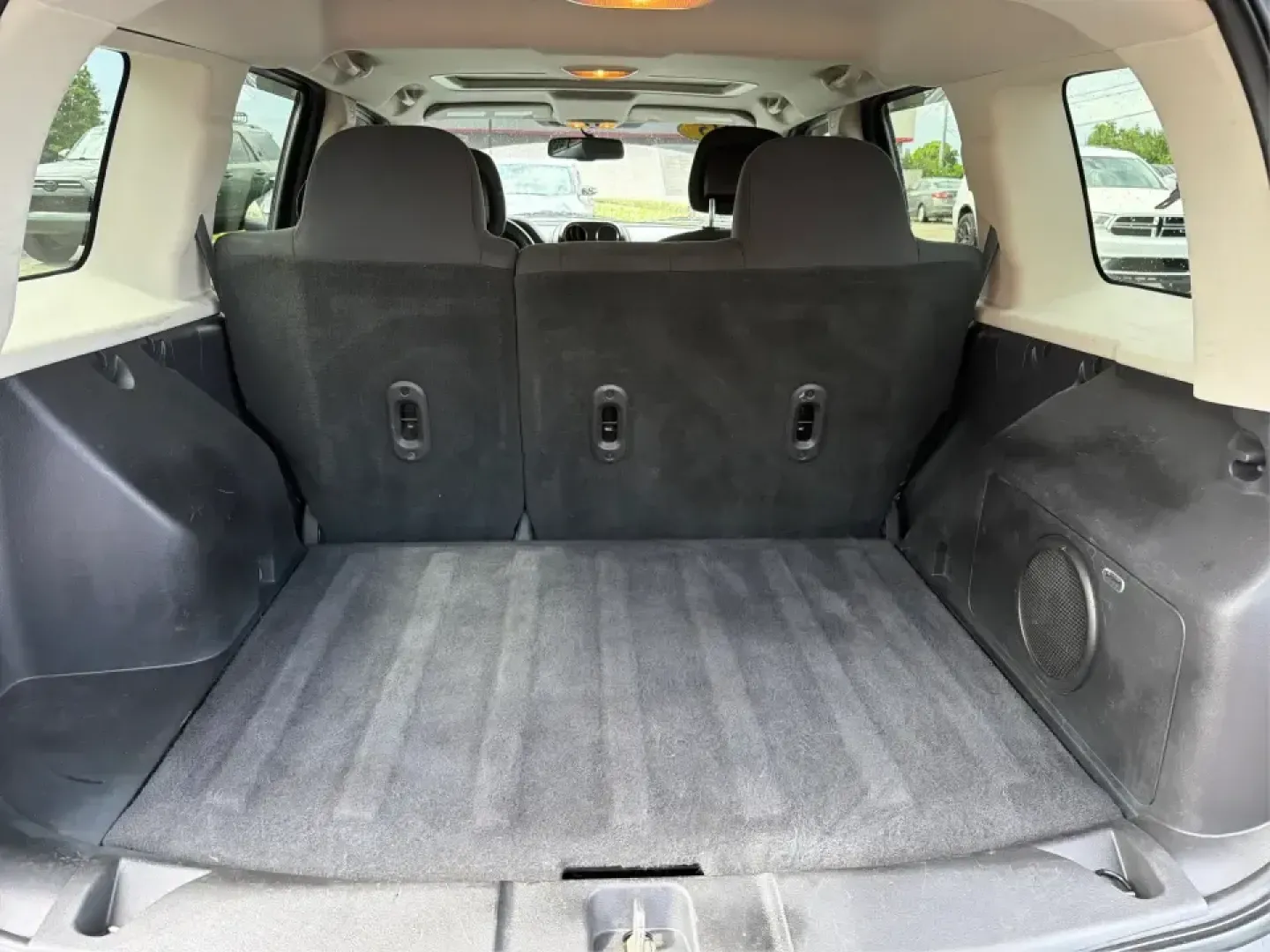 2015 Jeep Patriot Latitude 4WD (1C4NJRFB8FD) with an 2.4L L4 DOHC 16V engine, located at 401 Woodman Dr, Riverside, OH, 45431, (937) 908-9800, 39.760899, -84.123421 - Weekend getaways, snowy commutes, and everyday errands feel a lot easier when you've got an SUV that's ready for whatever Ohio throws your way. This **2015 Jeep Patriot Latitude 4WD** is a practical choice for drivers who want confident traction, versatile cargo space, and a comfortable cabin for fi - Photo#12