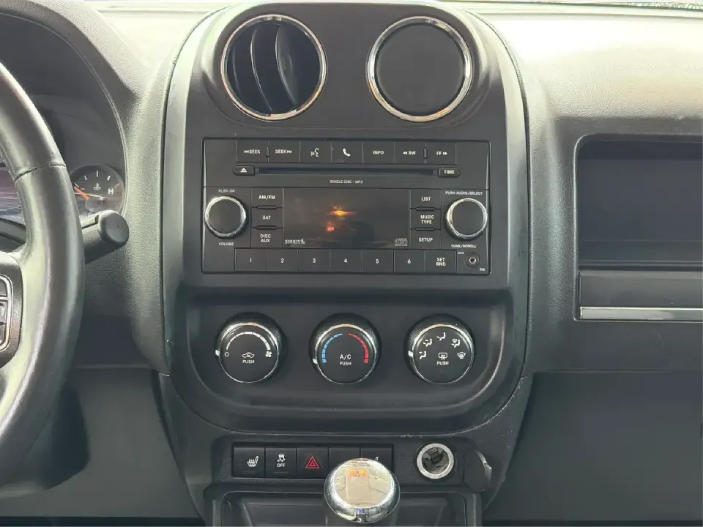 2015 Jeep Patriot Latitude 4WD (1C4NJRFB8FD) with an 2.4L L4 DOHC 16V engine, located at 401 Woodman Dr, Riverside, OH, 45431, (937) 908-9800, 39.760899, -84.123421 - Weekend getaways, snowy commutes, and everyday errands feel a lot easier when you've got an SUV that's ready for whatever Ohio throws your way. This **2015 Jeep Patriot Latitude 4WD** is a practical choice for drivers who want confident traction, versatile cargo space, and a comfortable cabin for fi - Photo#13