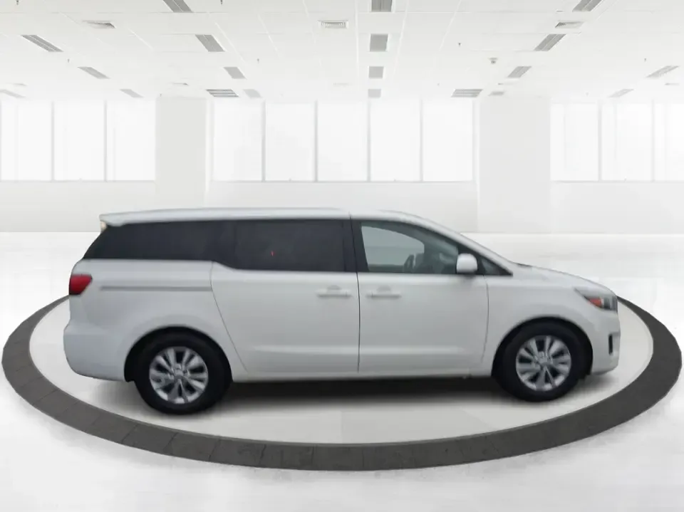 2016 Kia Sedona LX (KNDMB5C11G6) with an Lambda 3.3L V-6 gasoline direct injection engine, 6-Speed Automatic transmission, located at 401 Woodman Dr, Riverside, OH, 45431, (937) 908-9800, 39.760899, -84.123421 - Picture your next weekend: the kids piled in with snacks and sports gear, a cooler in the back, and enough space so everyone can stretch out on the drive down South Dixie Dr toward Dayton's parks, festivals, and family attractions. If you need a dependable, budget-smart people mover that keeps daily - Photo#1