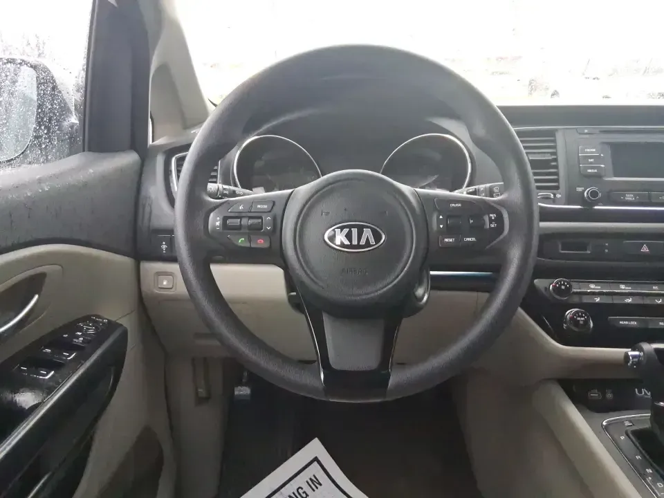 2016 Kia Sedona LX (KNDMB5C11G6) with an Lambda 3.3L V-6 gasoline direct injection engine, 6-Speed Automatic transmission, located at 401 Woodman Dr, Riverside, OH, 45431, (937) 908-9800, 39.760899, -84.123421 - Picture your next weekend: the kids piled in with snacks and sports gear, a cooler in the back, and enough space so everyone can stretch out on the drive down South Dixie Dr toward Dayton's parks, festivals, and family attractions. If you need a dependable, budget-smart people mover that keeps daily - Photo#13