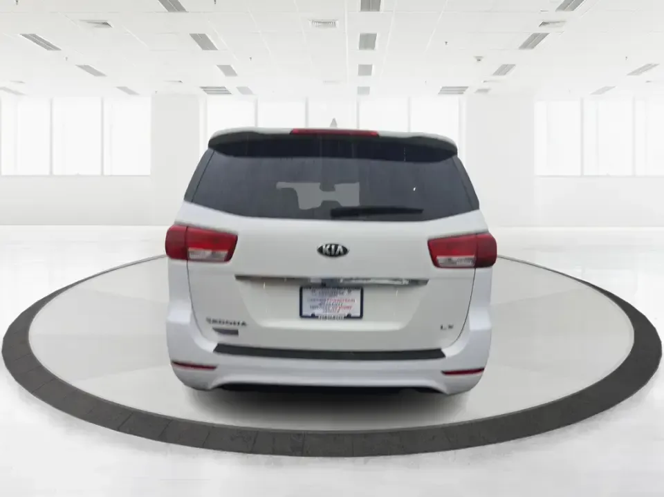 2016 Kia Sedona LX (KNDMB5C11G6) with an Lambda 3.3L V-6 gasoline direct injection engine, 6-Speed Automatic transmission, located at 880 E. National Road, Vandalia, OH, 45377, (937) 908-9800, 39.891918, -84.183594 - Picture your next weekend: the kids piled in with snacks and sports gear, a cooler in the back, and enough space so everyone can stretch out on the drive down South Dixie Dr toward Dayton's parks, festivals, and family attractions. If you need a dependable, budget-smart people mover that keeps daily - Photo#2