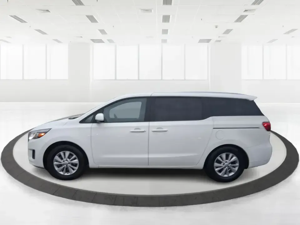 2016 Kia Sedona LX (KNDMB5C11G6) with an Lambda 3.3L V-6 gasoline direct injection engine, 6-Speed Automatic transmission, located at 880 E. National Road, Vandalia, OH, 45377, (937) 908-9800, 39.891918, -84.183594 - Picture your next weekend: the kids piled in with snacks and sports gear, a cooler in the back, and enough space so everyone can stretch out on the drive down South Dixie Dr toward Dayton's parks, festivals, and family attractions. If you need a dependable, budget-smart people mover that keeps daily - Photo#3