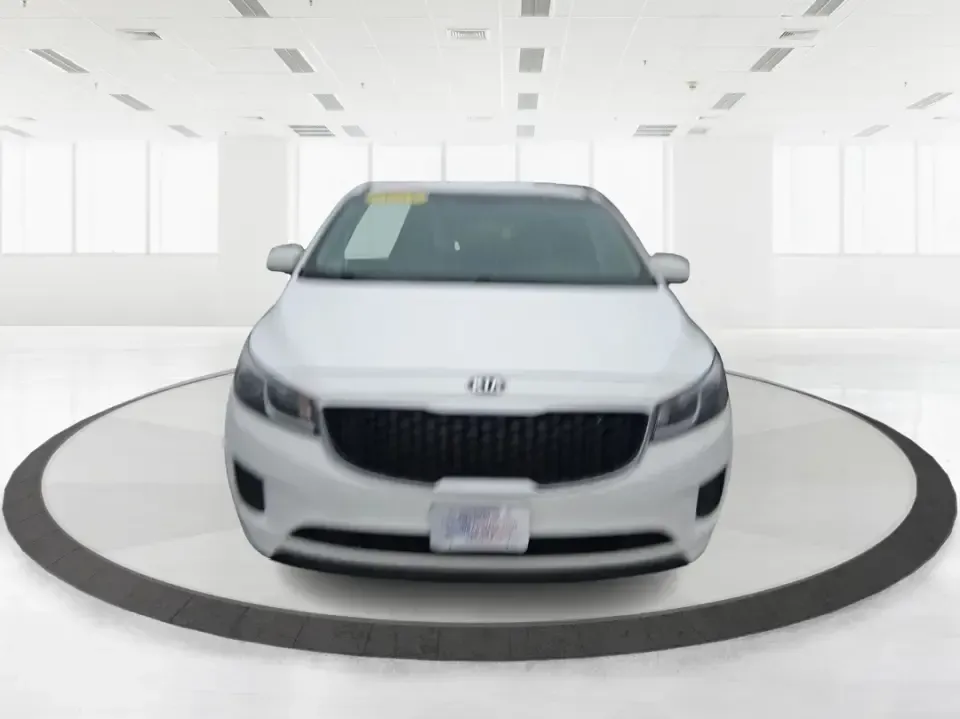 2016 Kia Sedona LX (KNDMB5C11G6) with an Lambda 3.3L V-6 gasoline direct injection engine, 6-Speed Automatic transmission, located at 880 E. National Road, Vandalia, OH, 45377, (937) 908-9800, 39.891918, -84.183594 - Picture your next weekend: the kids piled in with snacks and sports gear, a cooler in the back, and enough space so everyone can stretch out on the drive down South Dixie Dr toward Dayton's parks, festivals, and family attractions. If you need a dependable, budget-smart people mover that keeps daily - Photo#4