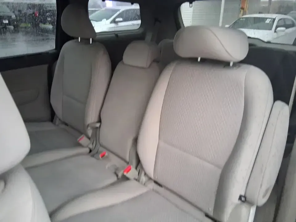 2016 Kia Sedona LX (KNDMB5C11G6) with an Lambda 3.3L V-6 gasoline direct injection engine, 6-Speed Automatic transmission, located at 880 E. National Road, Vandalia, OH, 45377, (937) 908-9800, 39.891918, -84.183594 - Picture your next weekend: the kids piled in with snacks and sports gear, a cooler in the back, and enough space so everyone can stretch out on the drive down South Dixie Dr toward Dayton's parks, festivals, and family attractions. If you need a dependable, budget-smart people mover that keeps daily - Photo#7