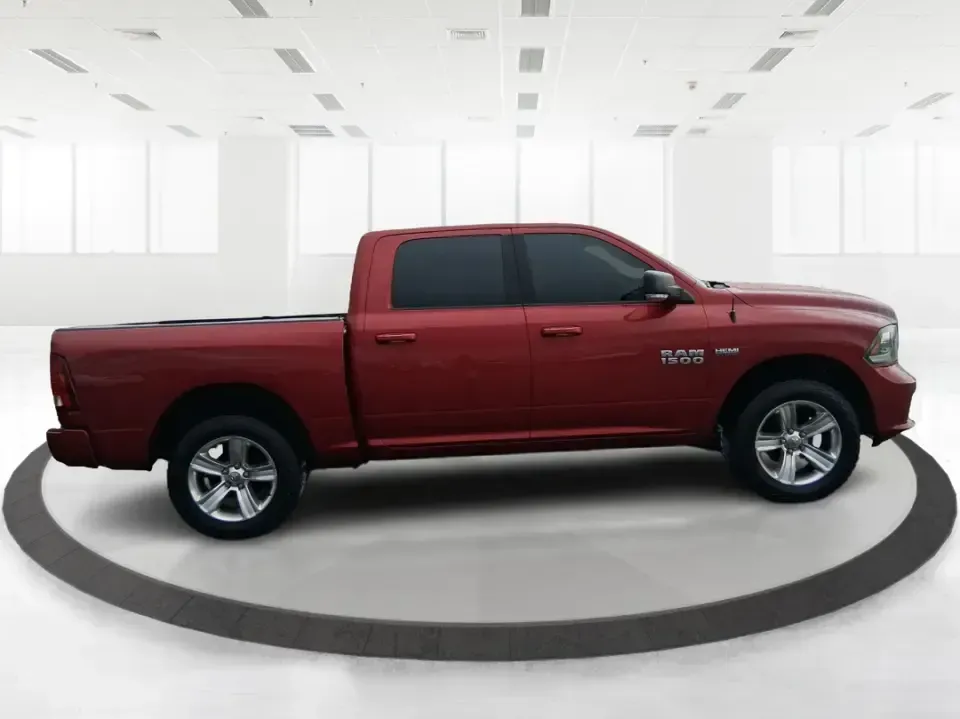 2014 Ram 1500 Sport (1C6RR7MT6ES) with an HEMI 5.7L V-8 variable valve control engine, 6-Speed Automatic transmission, located at 401 Woodman Dr, Riverside, OH, 45431, (937) 908-9800, 39.760899, -84.123421 - Need a truck that can handle weekday work, weekend getaways, and everything Ohio weather throws at you? This Flame Red Clearcoat 2014 Ram 1500 Sport Crew Cab 4WD is built for real life-hauling project supplies to a home in Riverside, towing toys for a day near Eastwood MetroPark, or loading up the f - Photo#1