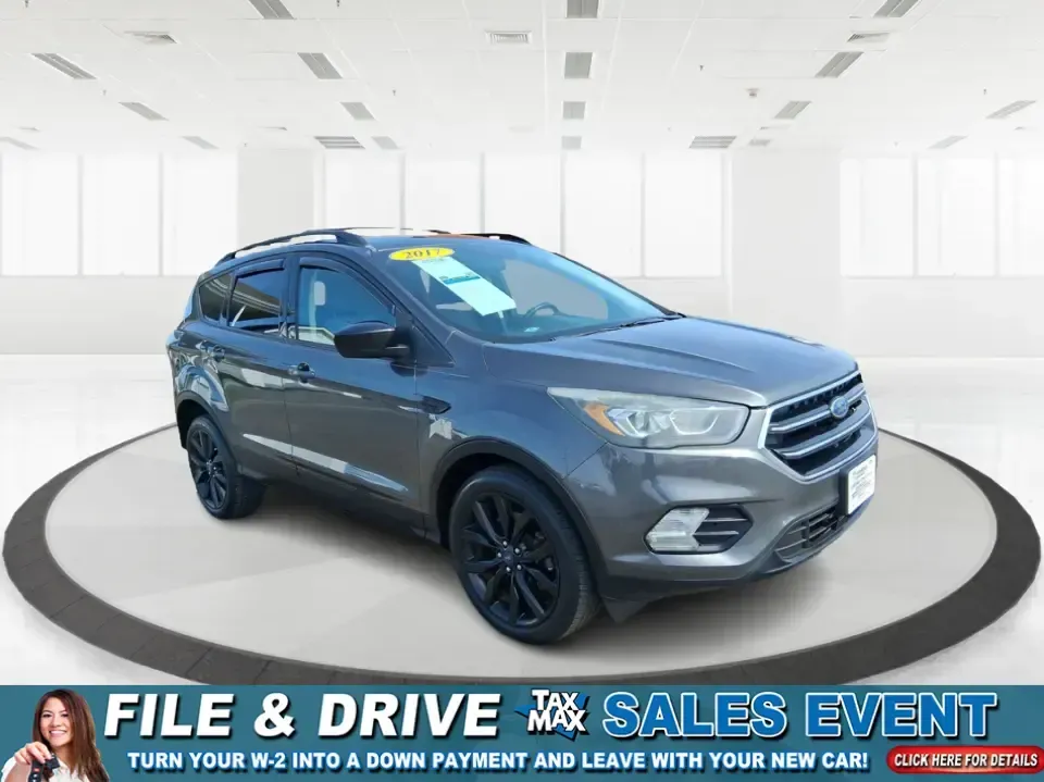 2017 Ford Escape SE (1FMCU9GD2HU) with an 1.5L L4 DOHC 16V engine, 6A transmission, located at 880 E. National Road, Vandalia, OH, 45377, (937) 908-9800, 39.891918, -84.183594 - Make every day easier-whether you're tackling a long commute up I-75, shuttling kids between school and practice, or packing up for a weekend escape to the Dayton area parks. This 2017 Ford Escape SE in Magnetic Metallic is the kind of compact SUV that fits real life in Vandalia, OH: easy to park, c - Photo#0