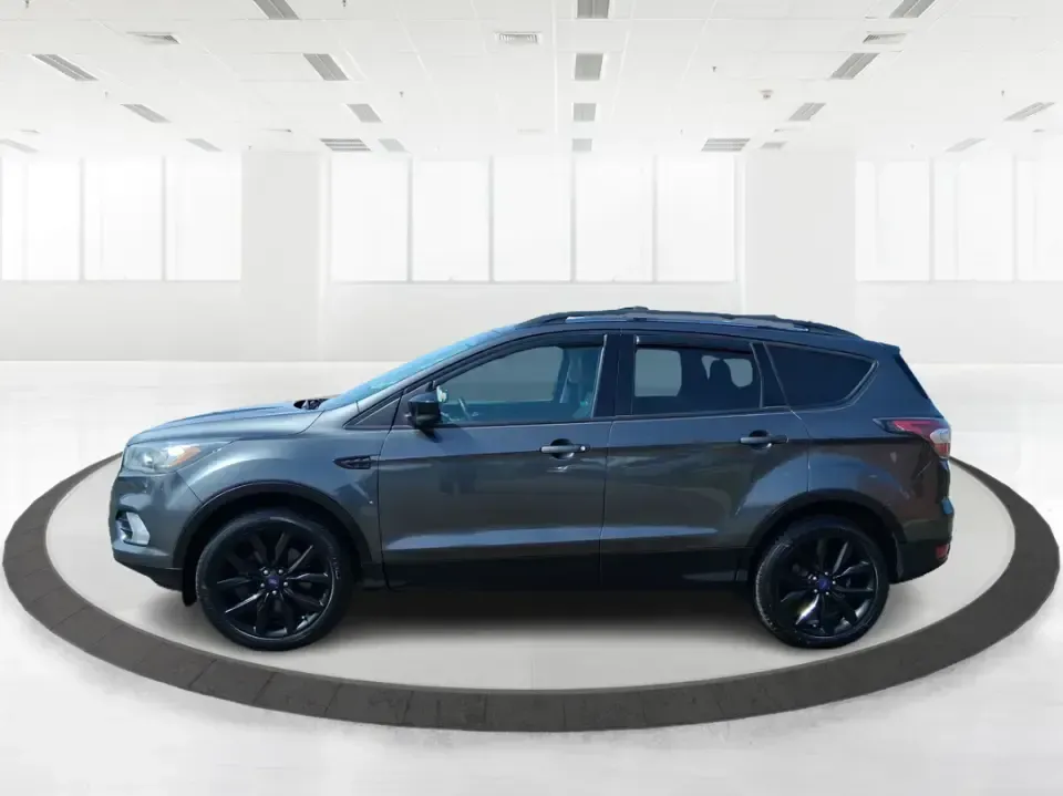 2017 Ford Escape SE (1FMCU9GD2HU) with an 1.5L L4 DOHC 16V engine, 6A transmission, located at 880 E. National Road, Vandalia, OH, 45377, (937) 908-9800, 39.891918, -84.183594 - Make every day easier-whether you're tackling a long commute up I-75, shuttling kids between school and practice, or packing up for a weekend escape to the Dayton area parks. This 2017 Ford Escape SE in Magnetic Metallic is the kind of compact SUV that fits real life in Vandalia, OH: easy to park, c - Photo#4