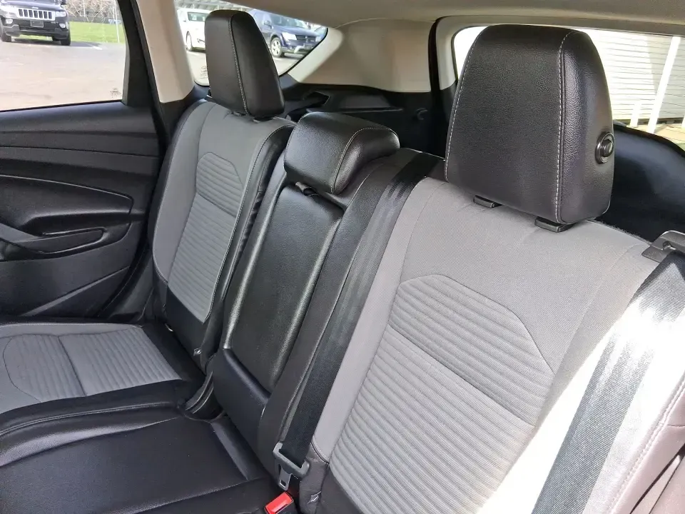 2017 Ford Escape SE (1FMCU9GD2HU) with an 1.5L L4 DOHC 16V engine, 6A transmission, located at 880 E. National Road, Vandalia, OH, 45377, (937) 908-9800, 39.891918, -84.183594 - Make every day easier-whether you're tackling a long commute up I-75, shuttling kids between school and practice, or packing up for a weekend escape to the Dayton area parks. This 2017 Ford Escape SE in Magnetic Metallic is the kind of compact SUV that fits real life in Vandalia, OH: easy to park, c - Photo#9