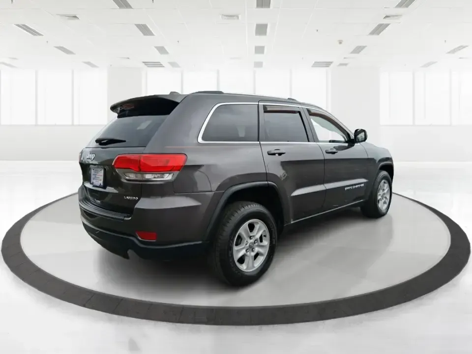 2015 Jeep Grand Cherokee Laredo (1C4RJFAG5FC) with an 3.6L V-6 DOHC engine, 8-Speed Automatic transmission, located at 1099 N County Rd 25A , Troy, OH, 45373, (937) 908-9800, 40.057079, -84.212883 - Need one SUV that can handle school drop-offs in the morning, a smooth I75 commute at lunchtime, and a last-minute weekend escape to the Miami Valley trails? This 2015 Jeep Grand Cherokee Laredo 4WD is built for real life in Troy, Ohio-comfortable enough for daily driving, confident enough for unpre - Photo#2