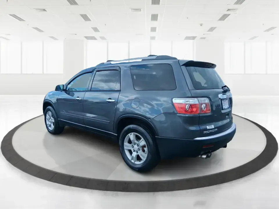 2012 GMC Acadia SL (1GKKRNED6CJ) with an 3.6L V-6 gasoline direct injection engine, 6-Speed Automatic transmission, located at 8750 N County Rd 25A, Piqua, OH, 45356, (937) 908-9800, 40.164391, -84.232513 - Pack up the kids, load the cooler, and point the SUV toward your next weekend getaway-this 2012 GMC Acadia SL is built for real-life Ohio driving, from school drop-offs and long commutes to road trips up I-75 and errands around Piqua. With three-row versatility, confident road manners, and family-fr - Photo#4