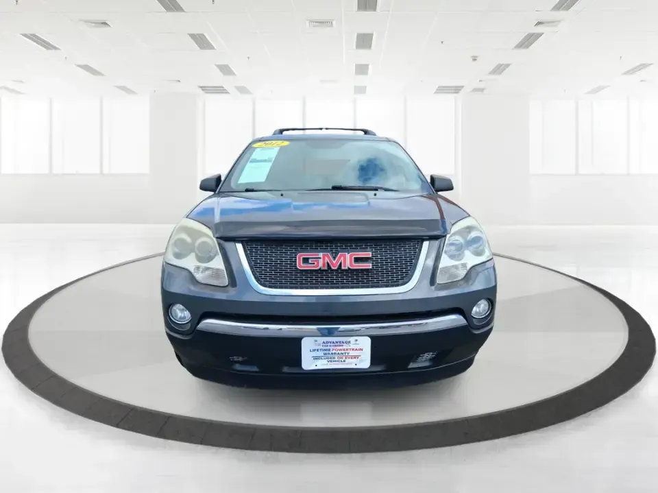 2012 GMC Acadia SL (1GKKRNED6CJ) with an 3.6L V-6 gasoline direct injection engine, 6-Speed Automatic transmission, located at 8750 N County Rd 25A, Piqua, OH, 45356, (937) 908-9800, 40.164391, -84.232513 - Pack up the kids, load the cooler, and point the SUV toward your next weekend getaway-this 2012 GMC Acadia SL is built for real-life Ohio driving, from school drop-offs and long commutes to road trips up I-75 and errands around Piqua. With three-row versatility, confident road manners, and family-fr - Photo#7