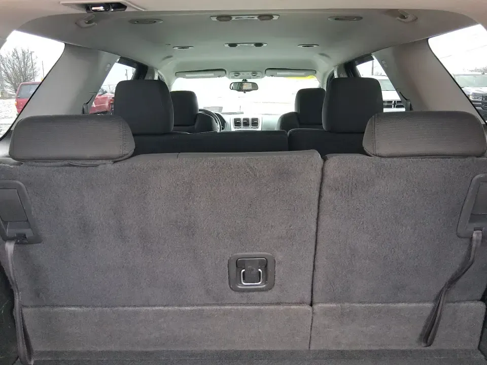 2012 GMC Acadia SL (1GKKRNED6CJ) with an 3.6L V-6 gasoline direct injection engine, 6-Speed Automatic transmission, located at 8750 N County Rd 25A, Piqua, OH, 45356, (937) 908-9800, 40.164391, -84.232513 - Pack up the kids, load the cooler, and point the SUV toward your next weekend getaway-this 2012 GMC Acadia SL is built for real-life Ohio driving, from school drop-offs and long commutes to road trips up I-75 and errands around Piqua. With three-row versatility, confident road manners, and family-fr - Photo#12