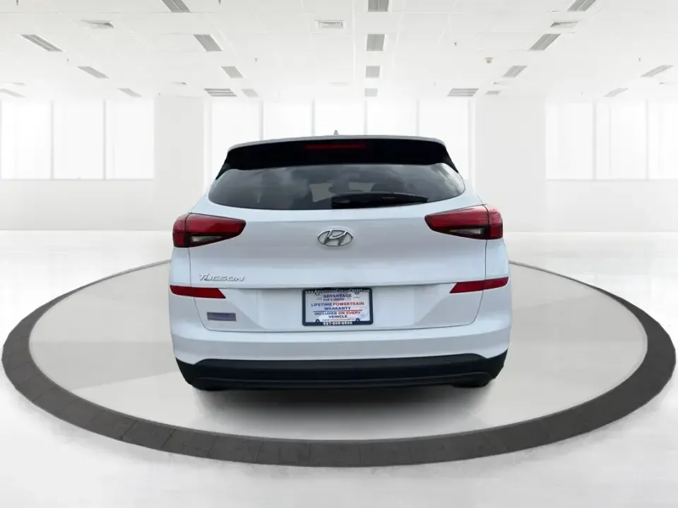 2019 Hyundai Tucson Value (KM8J33A41KU) with an Nu 2L I-4 gasoline direct injection engine, 6A transmission, located at 8750 N County Rd 25A, Piqua, OH, 45356, (937) 908-9800, 40.164391, -84.232513 - Picture your next Ohio weekend: loading up the cooler, tossing sports gear in the back, and cruising from Piqua to a family cookout or a quick getaway-without stressing about space, comfort, or the road ahead. This **2019 Hyundai Tucson Value** in **White Pearl** is the kind of compact SUV that fits - Photo#3