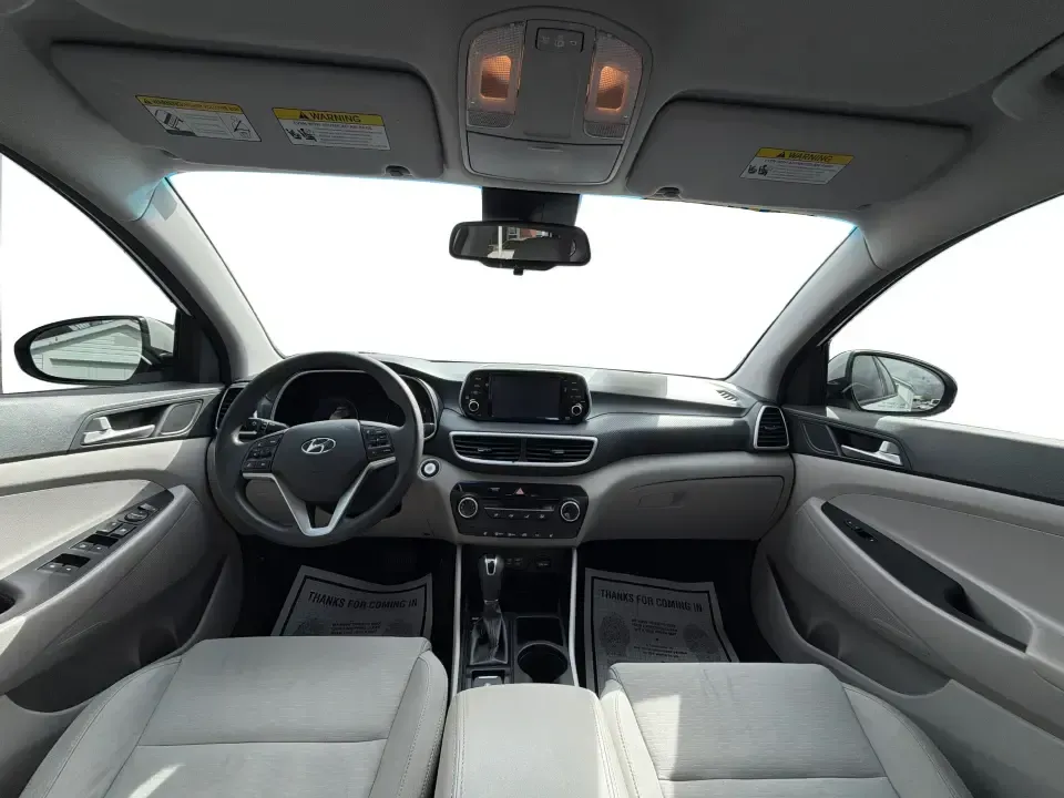 2019 Hyundai Tucson Value (KM8J33A41KU) with an Nu 2L I-4 gasoline direct injection engine, 6A transmission, located at 8750 N County Rd 25A, Piqua, OH, 45356, (937) 908-9800, 40.164391, -84.232513 - Picture your next Ohio weekend: loading up the cooler, tossing sports gear in the back, and cruising from Piqua to a family cookout or a quick getaway-without stressing about space, comfort, or the road ahead. This **2019 Hyundai Tucson Value** in **White Pearl** is the kind of compact SUV that fits - Photo#20