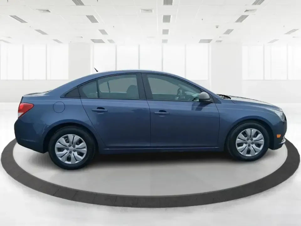 2014 Chevrolet Cruze LS Auto (1G1PA5SG7E7) with an ECOTEC 1.8L I-4 DOHC engine, 6-Speed Automatic transmission, located at 401 Woodman Dr, Riverside, OH, 45431, (937) 908-9800, 39.760899, -84.123421 - Picture a dependable daily commuter that still feels comfortable for weekend errands, school drop-offs, and the occasional road trip down I-675 or US-35-this 2014 Chevrolet Cruze LS Auto is the kind of practical sedan that fits real life in the Dayton area. Finished in Atlantis Blue Metallic, it's e - Photo#1