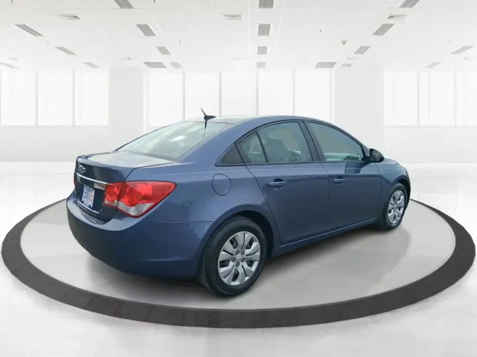 2014 Chevrolet Cruze LS Auto (1G1PA5SG7E7) with an ECOTEC 1.8L I-4 DOHC engine, 6-Speed Automatic transmission, located at 401 Woodman Dr, Riverside, OH, 45431, (937) 908-9800, 39.760899, -84.123421 - Picture a dependable daily commuter that still feels comfortable for weekend errands, school drop-offs, and the occasional road trip down I-675 or US-35-this 2014 Chevrolet Cruze LS Auto is the kind of practical sedan that fits real life in the Dayton area. Finished in Atlantis Blue Metallic, it's e - Photo#2