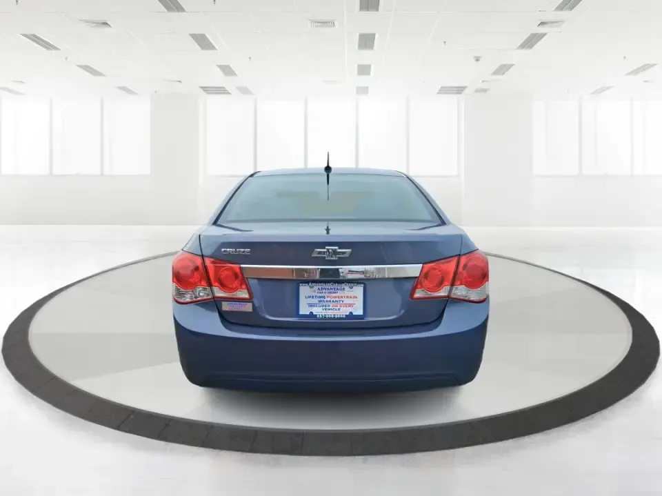 2014 Chevrolet Cruze LS Auto (1G1PA5SG7E7) with an ECOTEC 1.8L I-4 DOHC engine, 6-Speed Automatic transmission, located at 401 Woodman Dr, Riverside, OH, 45431, (937) 908-9800, 39.760899, -84.123421 - Picture a dependable daily commuter that still feels comfortable for weekend errands, school drop-offs, and the occasional road trip down I-675 or US-35-this 2014 Chevrolet Cruze LS Auto is the kind of practical sedan that fits real life in the Dayton area. Finished in Atlantis Blue Metallic, it's e - Photo#3