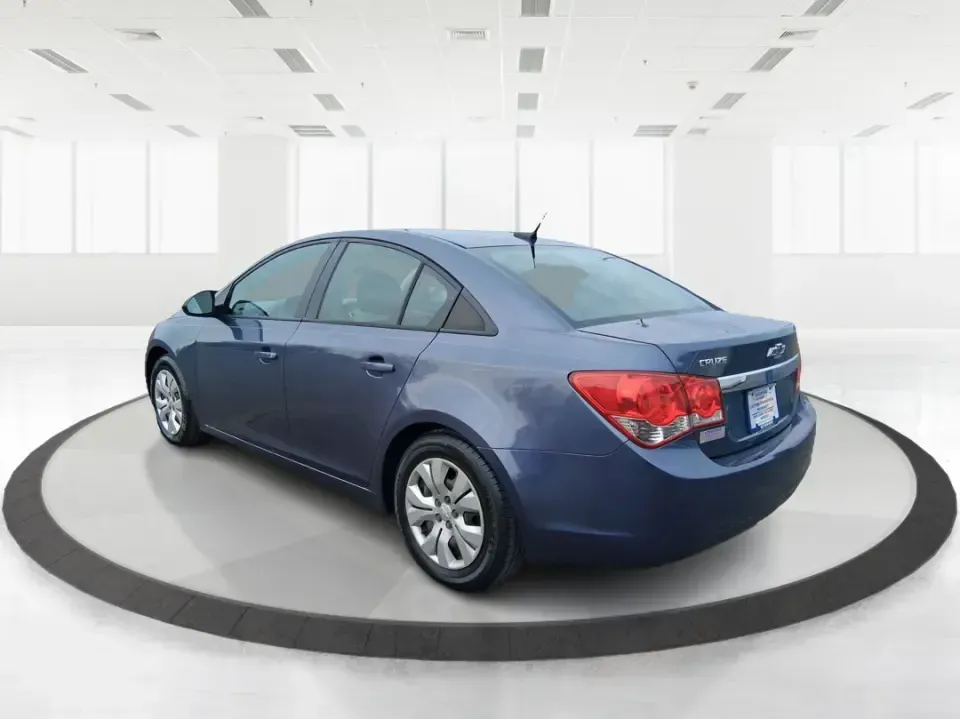2014 Chevrolet Cruze LS Auto (1G1PA5SG7E7) with an ECOTEC 1.8L I-4 DOHC engine, 6-Speed Automatic transmission, located at 401 Woodman Dr, Riverside, OH, 45431, (937) 908-9800, 39.760899, -84.123421 - Picture a dependable daily commuter that still feels comfortable for weekend errands, school drop-offs, and the occasional road trip down I-675 or US-35-this 2014 Chevrolet Cruze LS Auto is the kind of practical sedan that fits real life in the Dayton area. Finished in Atlantis Blue Metallic, it's e - Photo#4