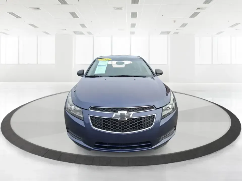 2014 Chevrolet Cruze LS Auto (1G1PA5SG7E7) with an ECOTEC 1.8L I-4 DOHC engine, 6-Speed Automatic transmission, located at 401 Woodman Dr, Riverside, OH, 45431, (937) 908-9800, 39.760899, -84.123421 - Picture a dependable daily commuter that still feels comfortable for weekend errands, school drop-offs, and the occasional road trip down I-675 or US-35-this 2014 Chevrolet Cruze LS Auto is the kind of practical sedan that fits real life in the Dayton area. Finished in Atlantis Blue Metallic, it's e - Photo#7