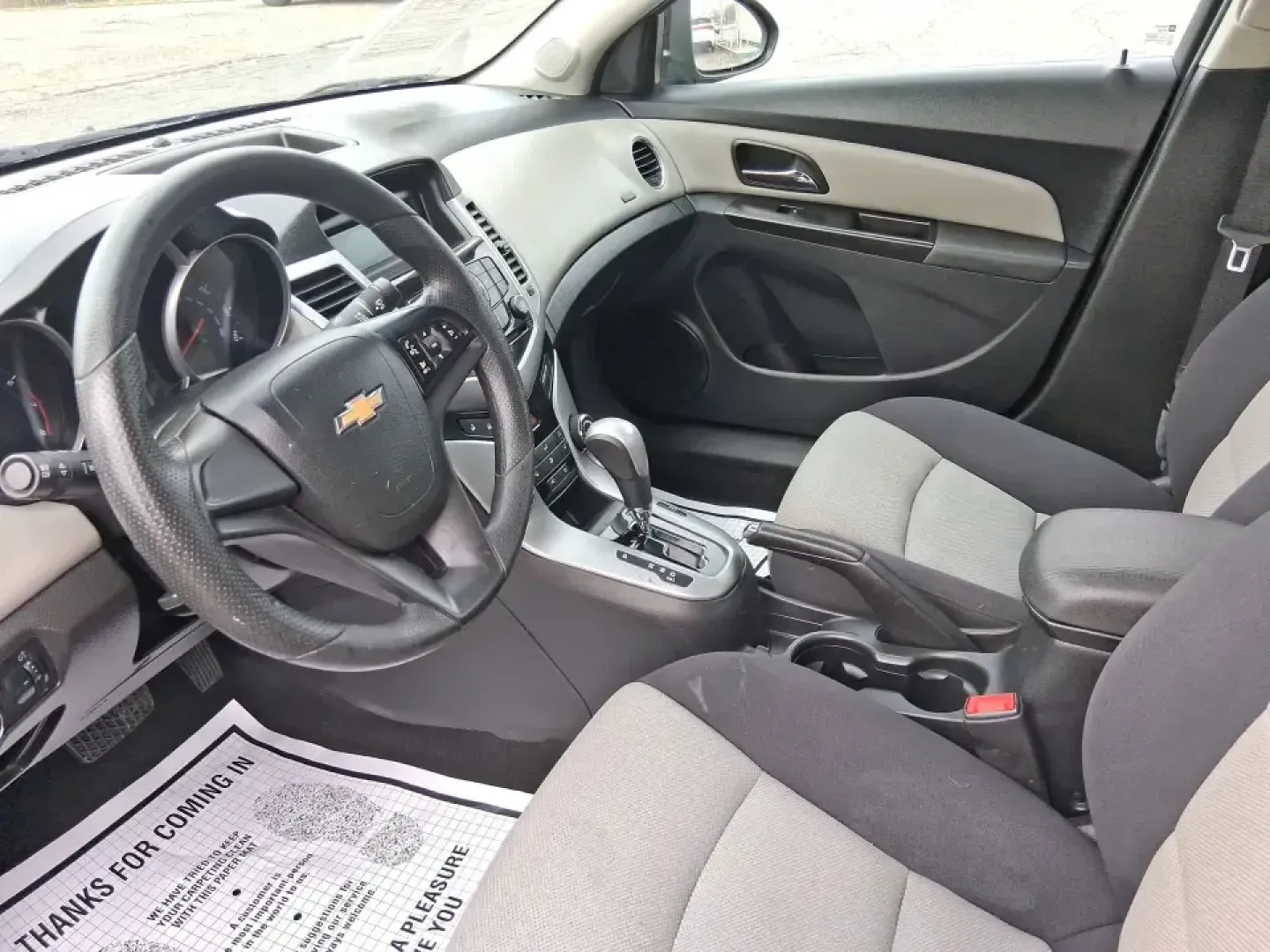 2014 Chevrolet Cruze LS Auto (1G1PA5SG7E7) with an ECOTEC 1.8L I-4 DOHC engine, 6-Speed Automatic transmission, located at 401 Woodman Dr, Riverside, OH, 45431, (937) 908-9800, 39.760899, -84.123421 - Picture a dependable daily commuter that still feels comfortable for weekend errands, school drop-offs, and the occasional road trip down I-675 or US-35-this 2014 Chevrolet Cruze LS Auto is the kind of practical sedan that fits real life in the Dayton area. Finished in Atlantis Blue Metallic, it's e - Photo#9