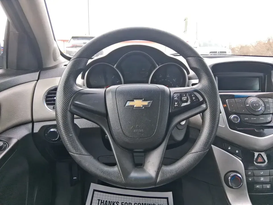 2014 Chevrolet Cruze LS Auto (1G1PA5SG7E7) with an ECOTEC 1.8L I-4 DOHC engine, 6-Speed Automatic transmission, located at 401 Woodman Dr, Riverside, OH, 45431, (937) 908-9800, 39.760899, -84.123421 - Picture a dependable daily commuter that still feels comfortable for weekend errands, school drop-offs, and the occasional road trip down I-675 or US-35-this 2014 Chevrolet Cruze LS Auto is the kind of practical sedan that fits real life in the Dayton area. Finished in Atlantis Blue Metallic, it's e - Photo#16