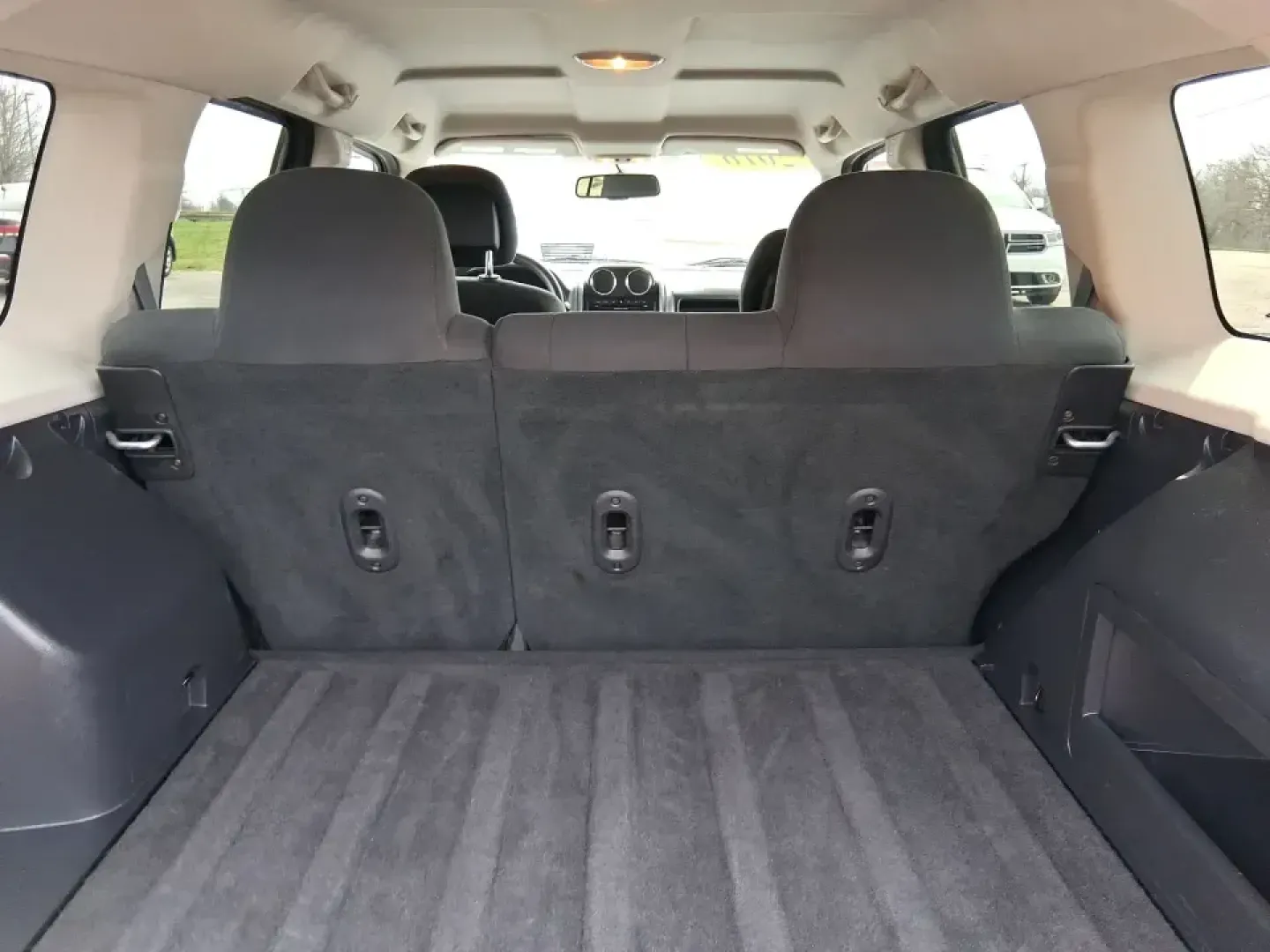 2016 Jeep Patriot Sport (1C4NJRBB2GD) with an 2.4L I-4 DOHC engine, located at 1230 East Main St, Xenia, OH, 45385, (937) 908-9800, 39.688026, -83.910172 - Ready for weekend escapes to John Bryan State Park, a confident commute down US-35, or a practical SUV that can handle Ohio's surprise weather? This 2016 Jeep Patriot Sport in Billet Silver Metallic Clearcoat is built for drivers who want everyday flexibility-room for errands and gear, sure-footed c - Photo#12