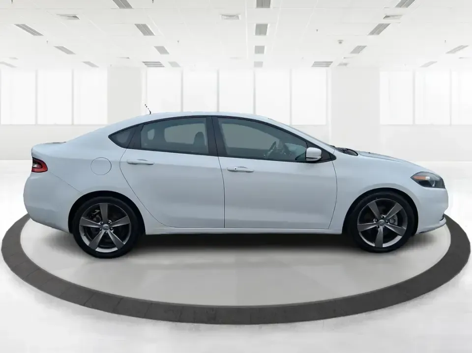 2014 Dodge Dart GT (1C3CDFEB0ED) with an MultiAir 2.4L I-4 variable valve control engine, located at 1099 N County Rd 25A , Troy, OH, 45373, (937) 908-9800, 40.057079, -84.212883 - Need a smart, sporty commuter that feels upscale for daily runs between Moraine and downtown Dayton, yet still has the comfort for weekend getaways to Carillon Historical Park or a Reds day trip? This 2014 Dodge Dart GT in Bright White Clearcoat is the kind of sedan that fits real life-easy to park, - Photo#1