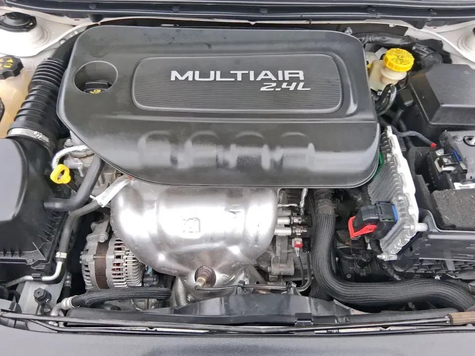 2014 Dodge Dart GT (1C3CDFEB0ED) with an MultiAir 2.4L I-4 variable valve control engine, located at 1099 N County Rd 25A , Troy, OH, 45373, (937) 908-9800, 40.057079, -84.212883 - Need a smart, sporty commuter that feels upscale for daily runs between Moraine and downtown Dayton, yet still has the comfort for weekend getaways to Carillon Historical Park or a Reds day trip? This 2014 Dodge Dart GT in Bright White Clearcoat is the kind of sedan that fits real life-easy to park, - Photo#11