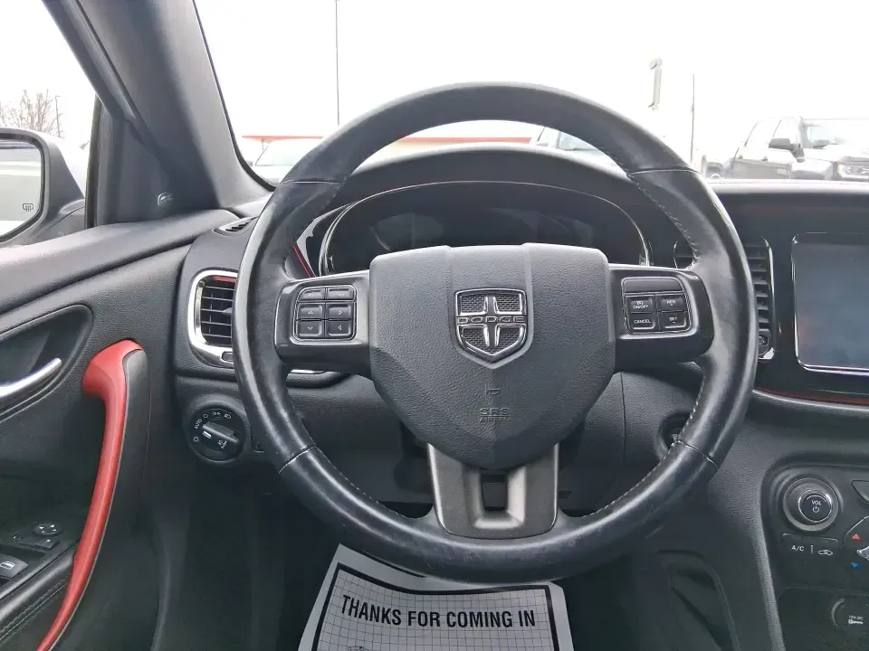 2014 Dodge Dart GT (1C3CDFEB0ED) with an MultiAir 2.4L I-4 variable valve control engine, located at 1099 N County Rd 25A , Troy, OH, 45373, (937) 908-9800, 40.057079, -84.212883 - Need a smart, sporty commuter that feels upscale for daily runs between Moraine and downtown Dayton, yet still has the comfort for weekend getaways to Carillon Historical Park or a Reds day trip? This 2014 Dodge Dart GT in Bright White Clearcoat is the kind of sedan that fits real life-easy to park, - Photo#16