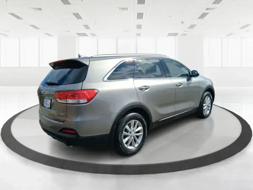 2018 Kia Sorento 2.4L LX (5XYPG4A33JG) with an 2.4L I-4 gasoline direct injection engine, 6A transmission, located at 1184 Kauffman Ave, Fairborn, OH, 45324, (937) 908-9800, 39.807072, -84.030914 - Need one SUV that can handle school drop-offs in the morning, a long commute down I675 in the afternoon, and a weekend road trip to the National Museum of the U.S. Air Force without feeling cramped? This 2018 Kia Sorento LX is built for real-life schedules-comfortable, practical, and ready for every - Photo#2