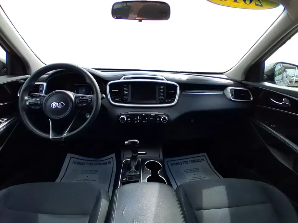 2018 Kia Sorento 2.4L LX (5XYPG4A33JG) with an 2.4L I-4 gasoline direct injection engine, 6A transmission, located at 1184 Kauffman Ave, Fairborn, OH, 45324, (937) 908-9800, 39.807072, -84.030914 - Need one SUV that can handle school drop-offs in the morning, a long commute down I675 in the afternoon, and a weekend road trip to the National Museum of the U.S. Air Force without feeling cramped? This 2018 Kia Sorento LX is built for real-life schedules-comfortable, practical, and ready for every - Photo#19