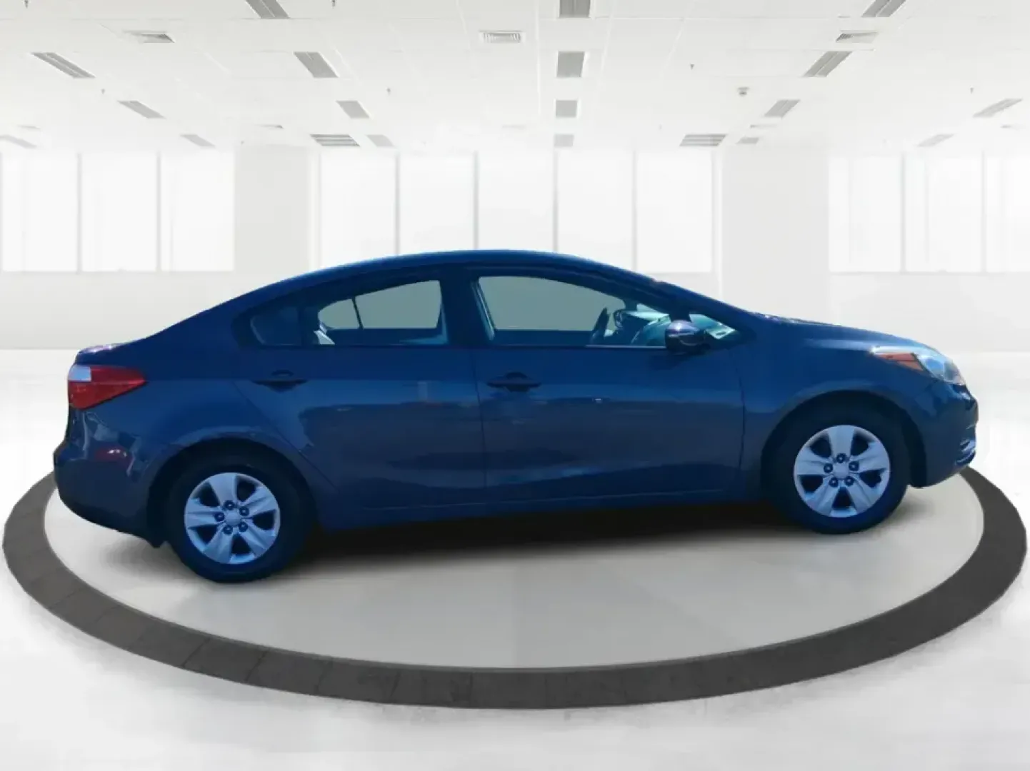 2016 Kia Forte LX (KNAFX4A63G5) with an 1.8L I-4 DOHC engine, 6-Speed Automatic transmission, located at 1951 S Dayton Lakeview Rd., New Carlisle, OH, 45344, (937) 908-9800, 39.890999, -84.050255 - Need a dependable commuter that still feels comfortable for weekend plans around the Miami Valley? This **2016 Kia Forte LX** in **Steel Blue Metallic** is a smart, budget-friendly sedan that fits real life in **Fairborn, Ohio**-whether you're driving to Wright-Patterson AFB, heading to class, or cr - Photo#1