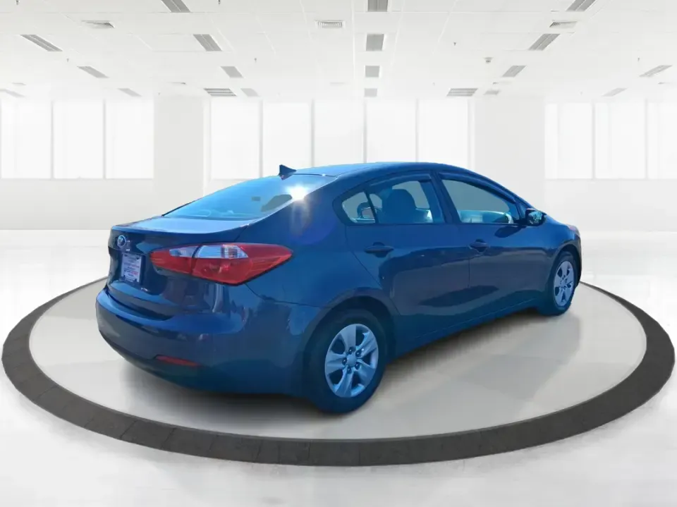 2016 Kia Forte LX (KNAFX4A63G5) with an 1.8L I-4 DOHC engine, 6-Speed Automatic transmission, located at 1951 S Dayton Lakeview Rd., New Carlisle, OH, 45344, (937) 908-9800, 39.890999, -84.050255 - Need a dependable commuter that still feels comfortable for weekend plans around the Miami Valley? This **2016 Kia Forte LX** in **Steel Blue Metallic** is a smart, budget-friendly sedan that fits real life in **Fairborn, Ohio**-whether you're driving to Wright-Patterson AFB, heading to class, or cr - Photo#2