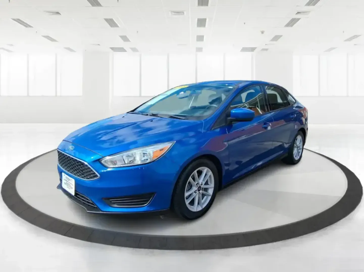 2018 Ford Focus SE (1FADP3FE4JL) with an 1.0L L3 engine, Automatic transmission, located at 1951 S Dayton Lakeview Rd., New Carlisle, OH, 45344, (937) 908-9800, 39.890999, -84.050255 - Need a dependable commuter that's easy to park downtown, comfortable on I70, and efficient enough for everyday errands from Meijer runs to school drop-offs? This 2018 Ford Focus SE sedan is a smart, budget-friendly choice for life in and around New Carlisle, offering modern tech, confidence-inspirin - Photo#8