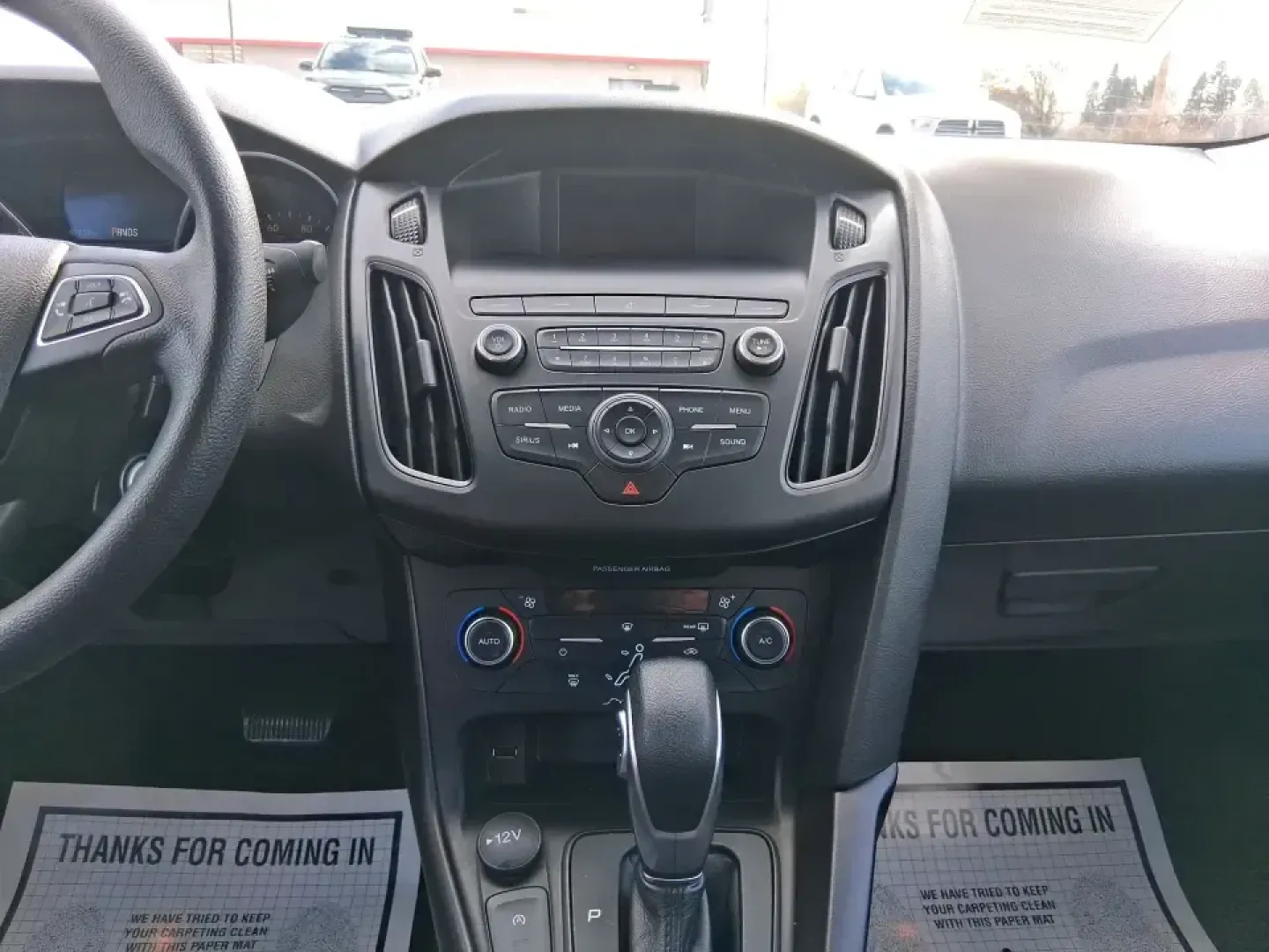 2018 Ford Focus SE (1FADP3FE4JL) with an 1.0L L3 engine, Automatic transmission, located at 1951 S Dayton Lakeview Rd., New Carlisle, OH, 45344, (937) 908-9800, 39.890999, -84.050255 - Need a dependable commuter that's easy to park downtown, comfortable on I70, and efficient enough for everyday errands from Meijer runs to school drop-offs? This 2018 Ford Focus SE sedan is a smart, budget-friendly choice for life in and around New Carlisle, offering modern tech, confidence-inspirin - Photo#13